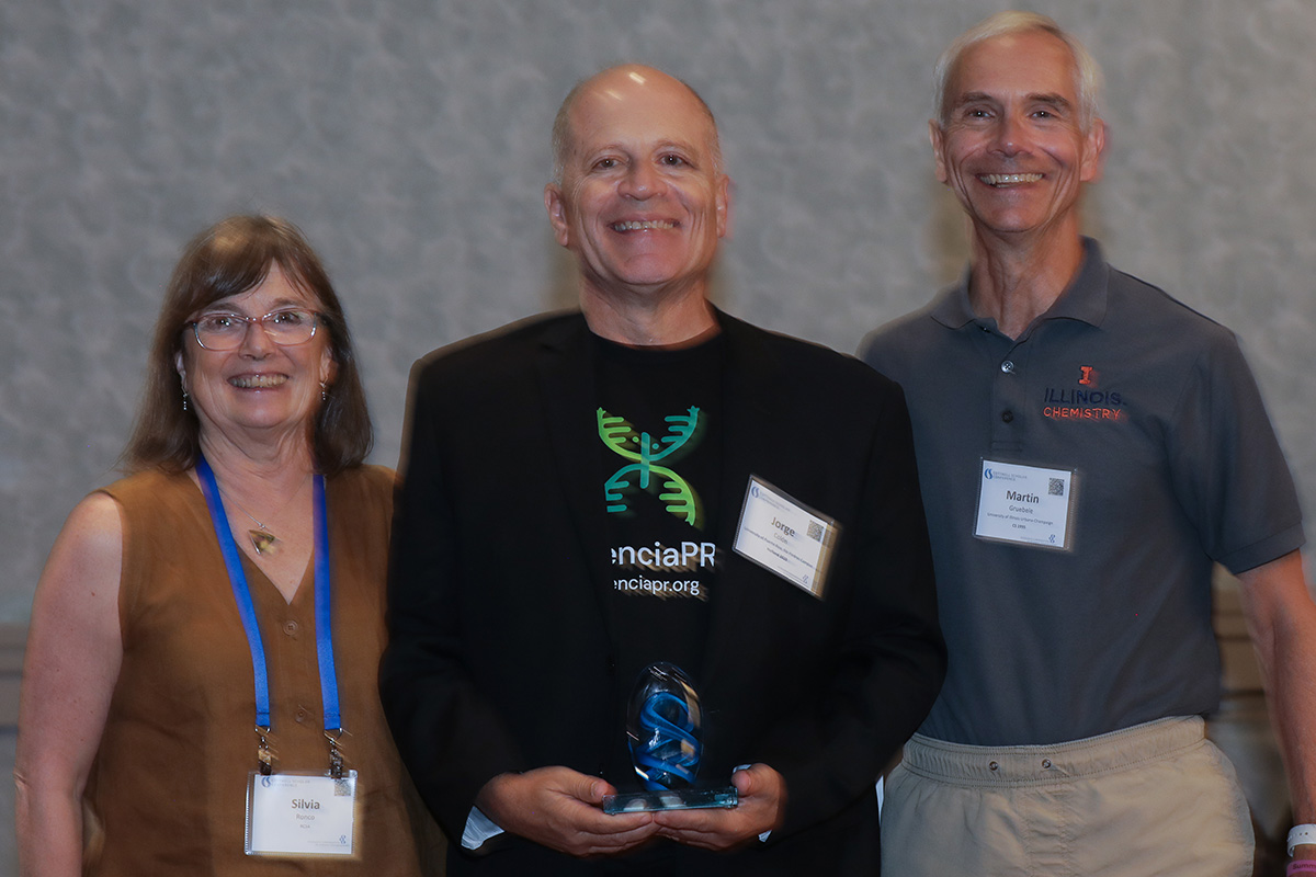 three people in a posed award photo at the 2026 Cottrell Scholars Conference