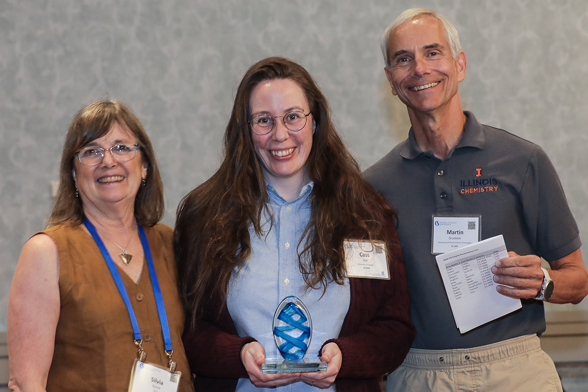 three people in a posed award photo at the 2026 Cottrell Scholars Conference