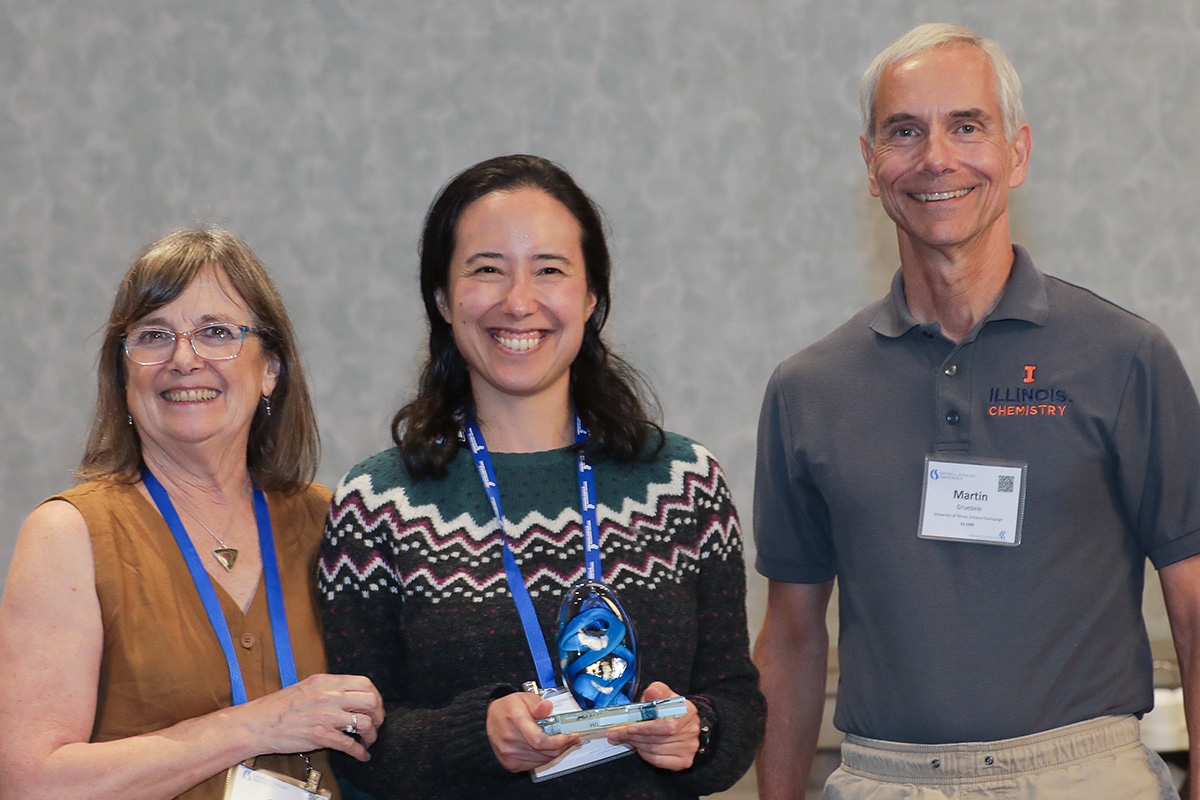 three people in a posed award photo at the 2026 Cottrell Scholars Conference