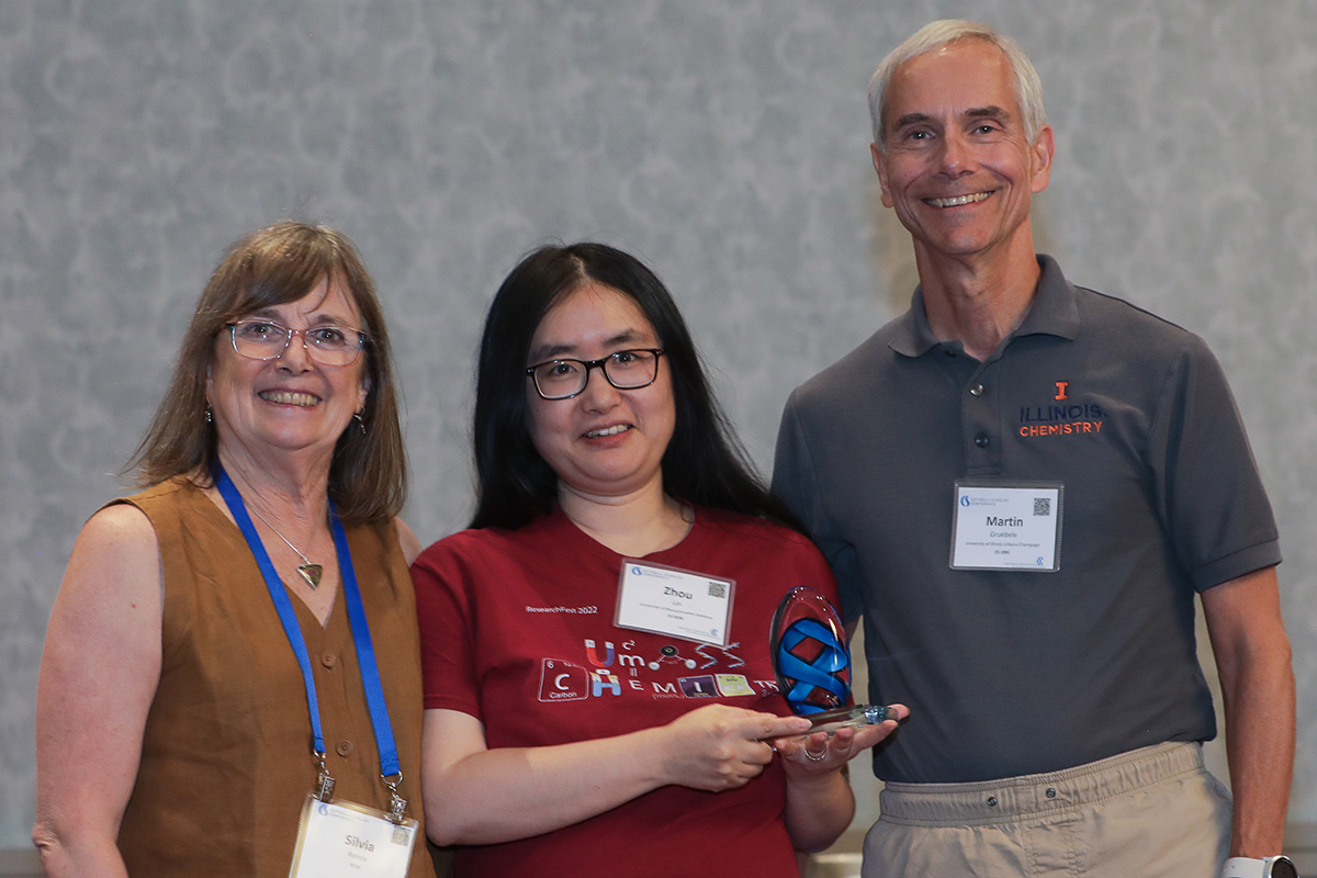 three people in a posed award photo at the 2026 Cottrell Scholars Conference