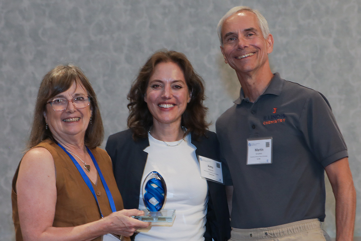 three people in a posed award photo at the 2026 Cottrell Scholars Conference