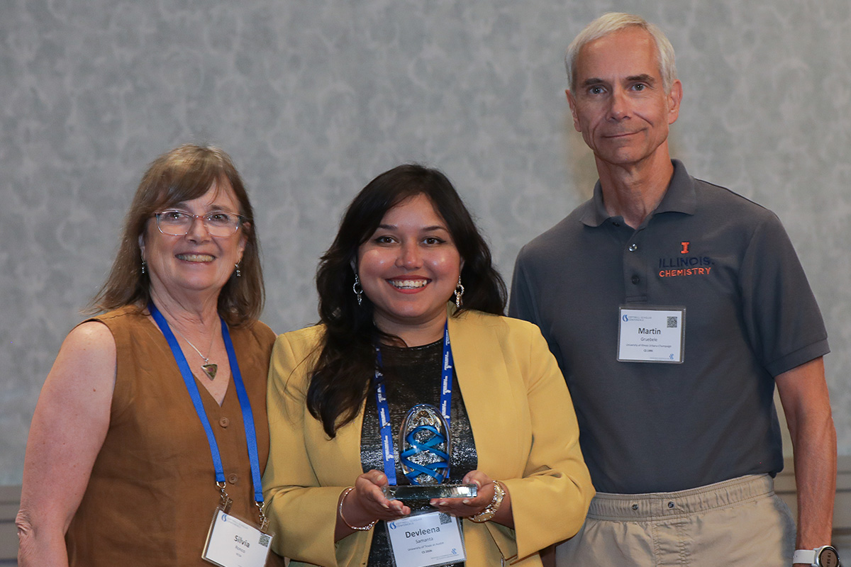three people in a posed award photo at the 2026 Cottrell Scholars Conference