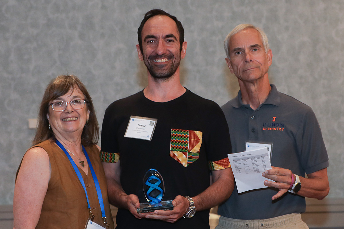 three people in a posed award photo at the 2026 Cottrell Scholars Conference