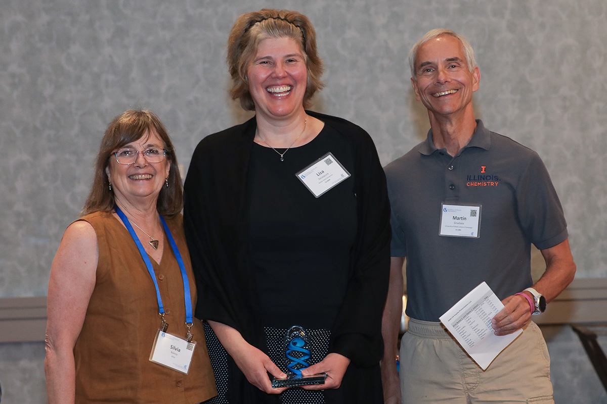 three people in a posed award photo at the 2026 Cottrell Scholars Conference