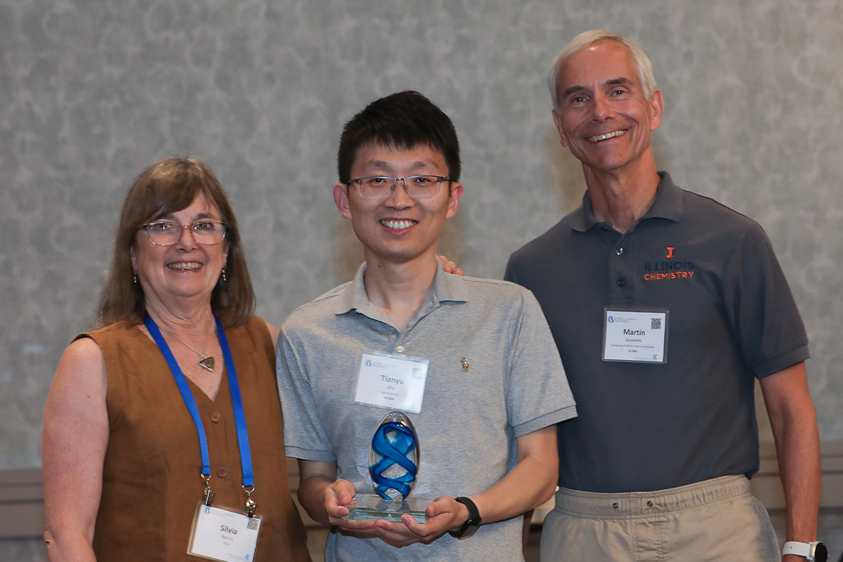 three people in a posed award photo at the 2026 Cottrell Scholars Conference